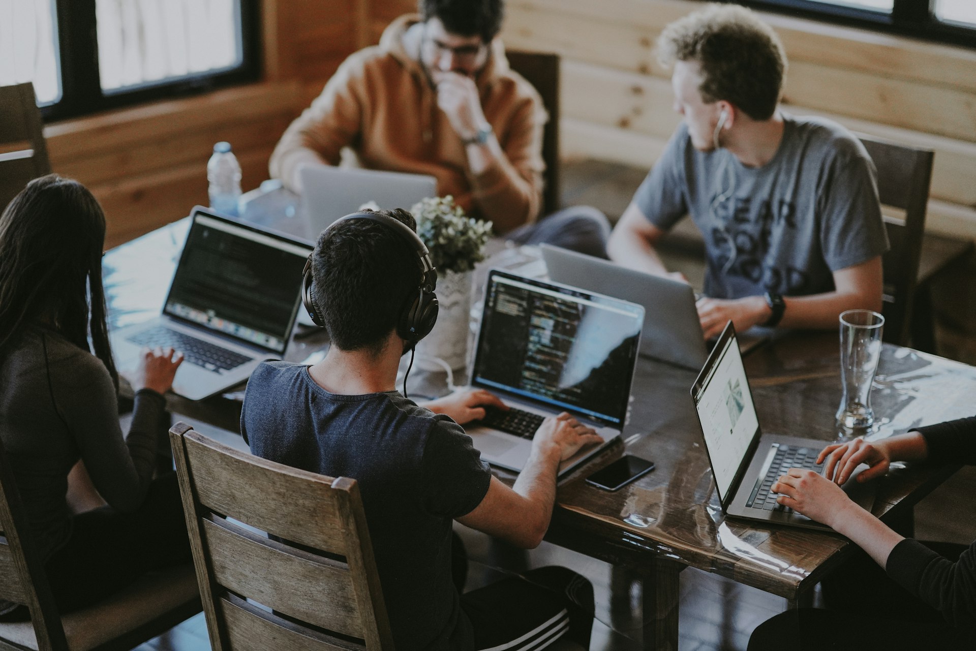 Diverse team collaborating at a large table